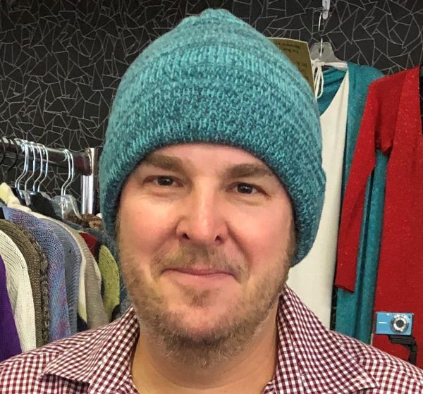 Photo of man wearing cashmere hat